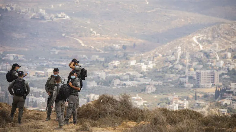 Border Police stand guard outside Yitzhar