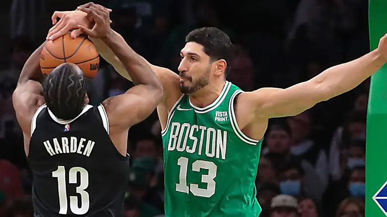 Boston Celtics center Enes Kanter (13) denies Brooklyn Nets guard James Harden (13)