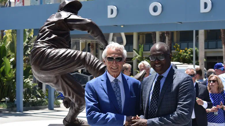Sandy Koufax, left, with sculptor Branly Cadet.