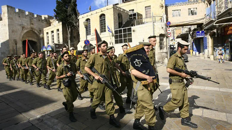 IDF march with Torah scroll