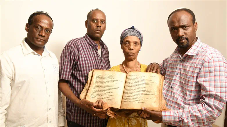Ayanawo Ferada Senebato, right, and his family shown in Ashkelon