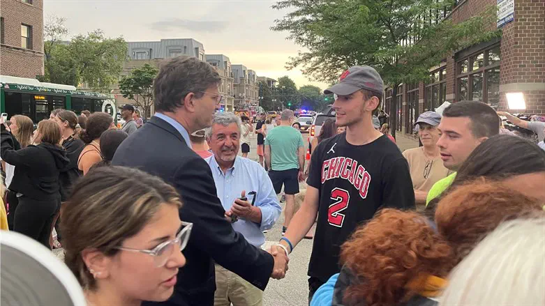 Brad Schneider chats with a constituent two days after the shooting