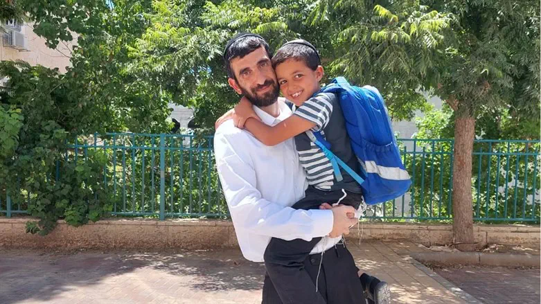 Shai Ben Shlomo with his young son, after making a miraculous recovery