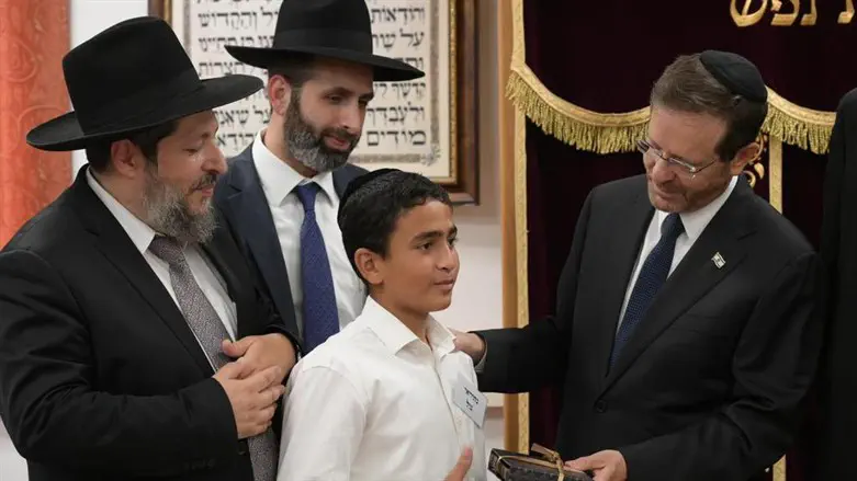 President Herzog's gift to boy who lost father in terror attack