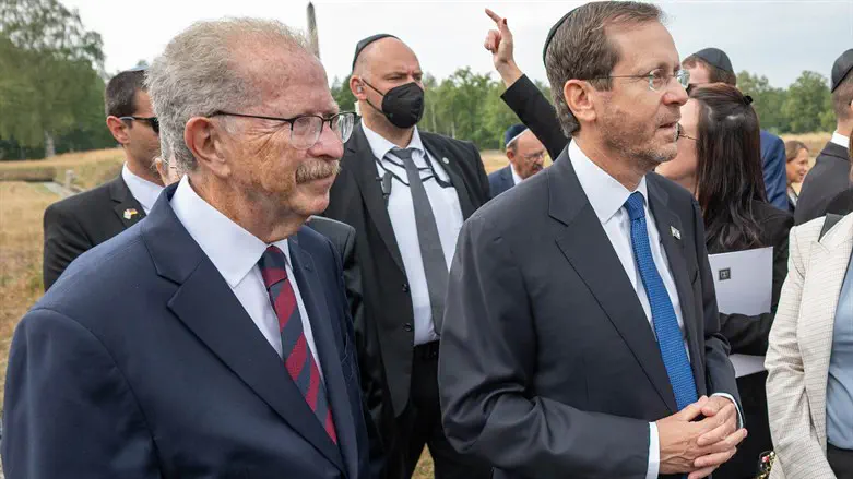 Menachem Rosensaft (L) & Israel's Pres. Herzog (R) at the Bergen Belsen concentration camp
