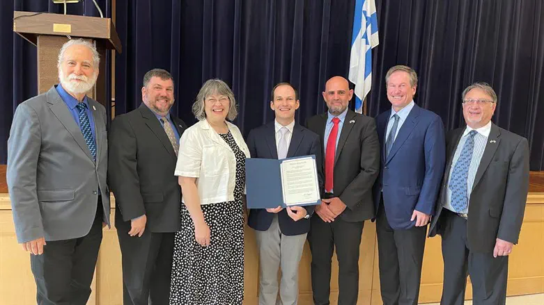 Wichita Mayor Brandon Whipple and the proclamation adopting the IHRA definition
