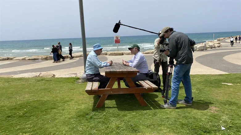 Shaul Ladany (seated, left) and Jeremy Schaap (seated, right) in Tel Aviv