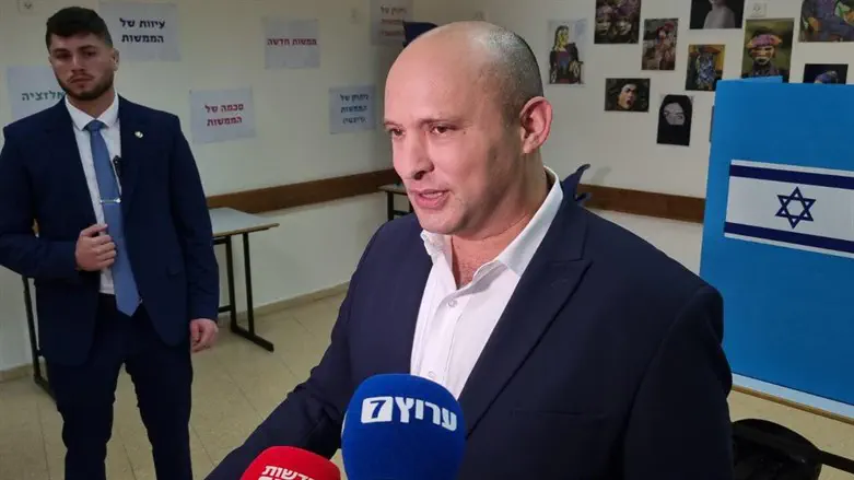 Naftali Bennett at the voting station