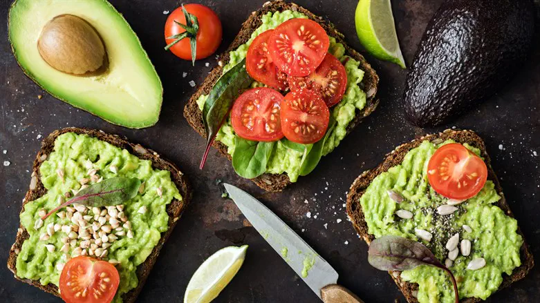 Healthy green veggie avocado toast with sprouts