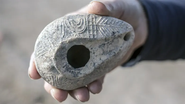 .The lamp, adorned with an eight-branched menorah