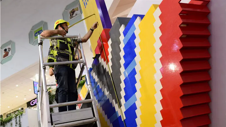 Building menorah from Lego in Tel Aviv
