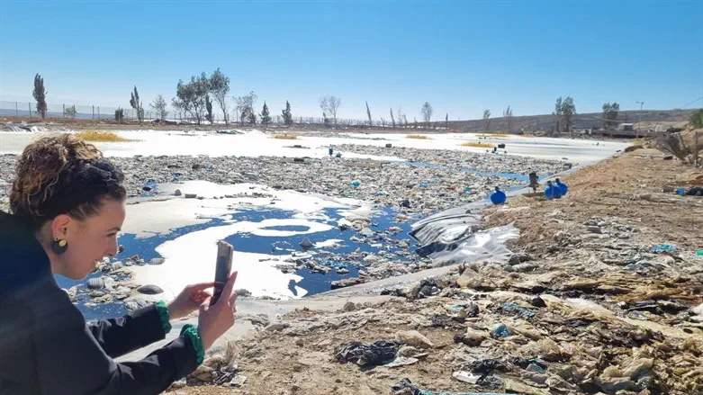  Minister Silman overlooking water pollution