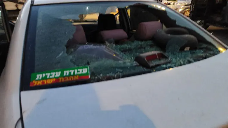 car hit by rocks (archive)