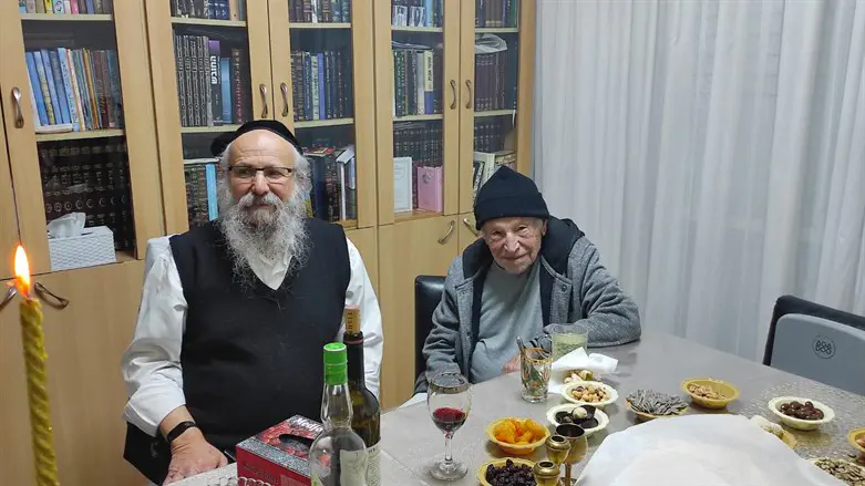 Yosef Azrad (left) and Mordechai Greenstein celebrating Mimouna