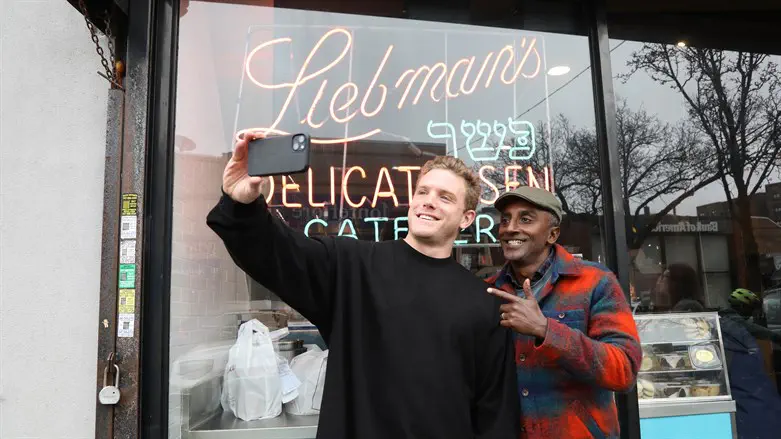 New York Yankees outfielder Harrison Bader, left, and celebrity chef Marcus Samu