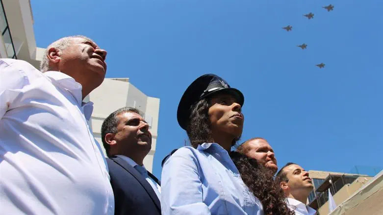 Watching the flyover in Tiberias
