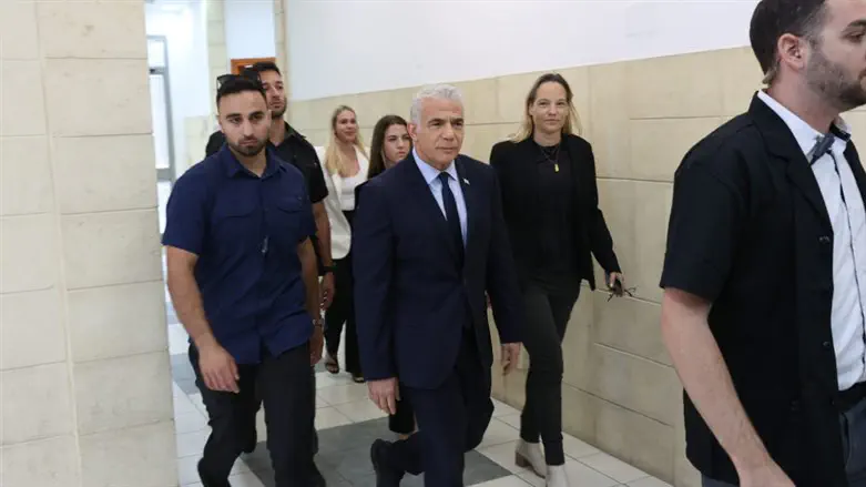 Yair Lapid arrives to testify in Netanyahu's trial