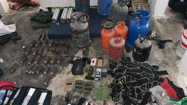 Some of the confiscated materials and weapons