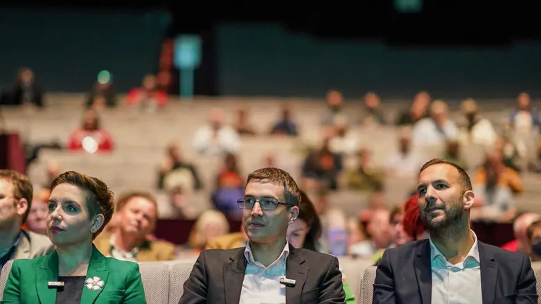 Green Party co-leaders Carla Denyer (L) and Adrian Ramsay (C) with deputy leader