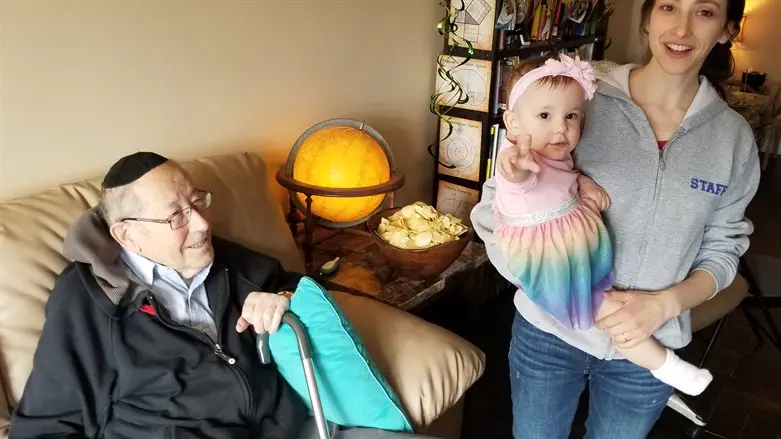 A photo of Leib (Louis) at the one-year birthday party of his great granddaughte