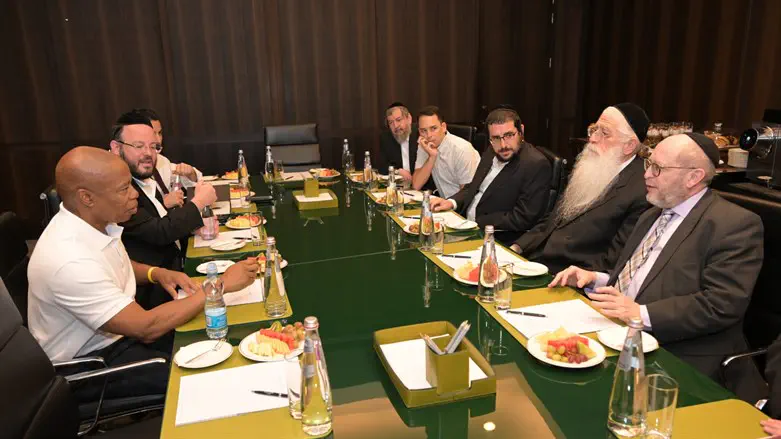 The meeting between Adams and Porush