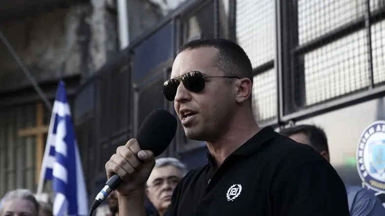 Then-Golden Dawn lawmaker Ilias Kasidiaris at a rally in central Athens, Sept. 2018.
