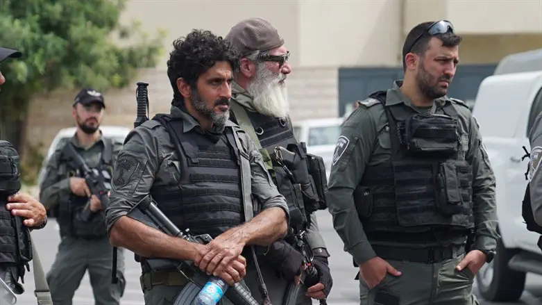 Tzachi Halevi (L) during the raid
