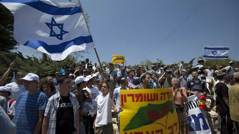 Israelis march in Judea and Samaria
