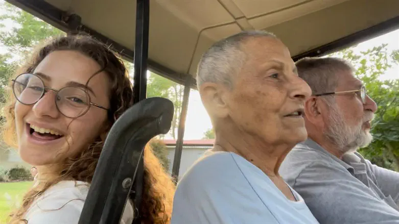 Ofir Metzger with her grandparents Tamar and Yoram