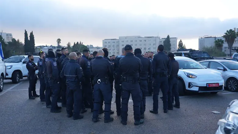 Policemen ready for demolition