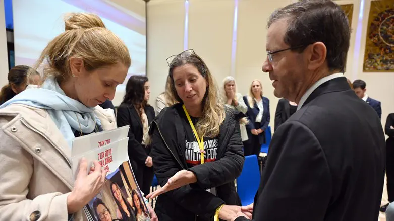 President Herzog with the families 
