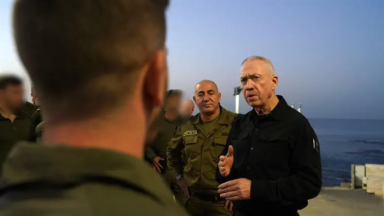 Gallant flanked by Rear Admiral Salama and naval commandos