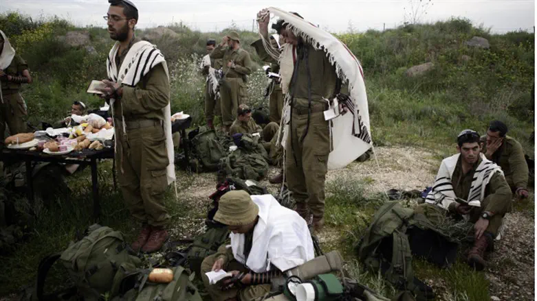 Soldiers praying at dawn