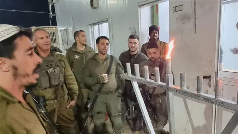 IDF reservists lighting the menorah