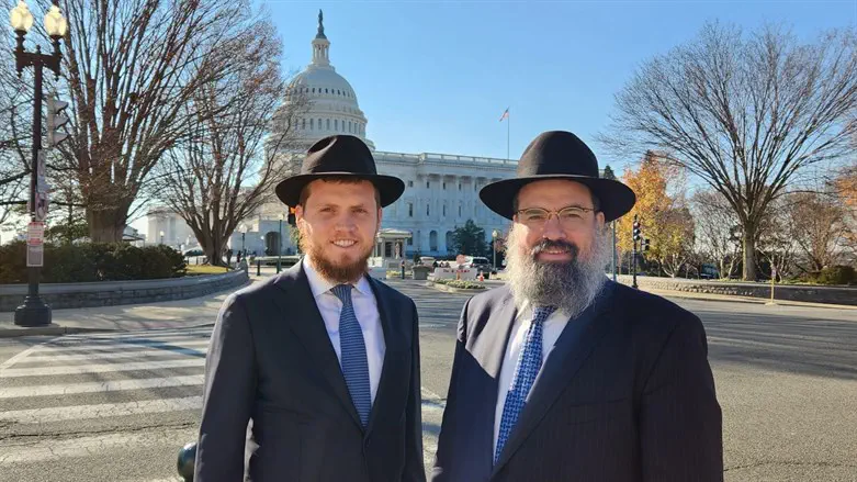 Rabbi Menachem Shemtov, left, poses with