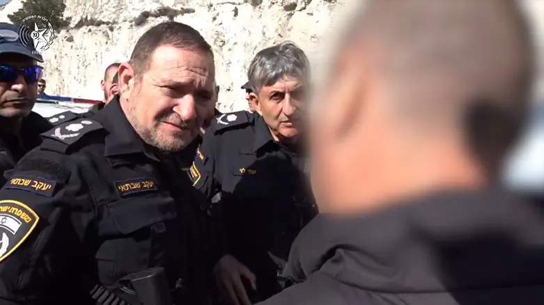 The officer meeting the Police Comissioner