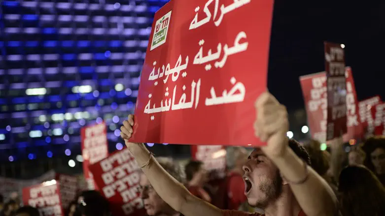 Leftists protest in Tel Aviv against