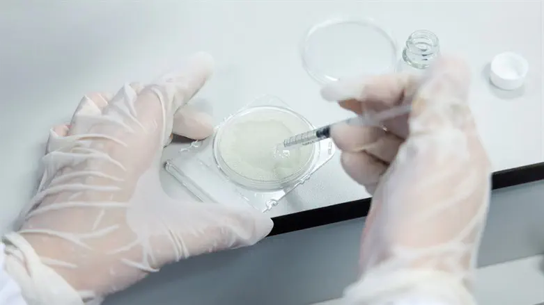 Scientist in lab (illustrative)