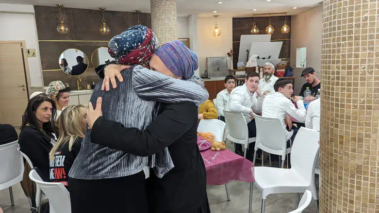 MInister Strook with hostages' families