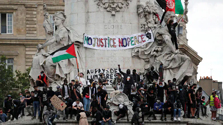 PLO flag waved at BLM rally in Paris