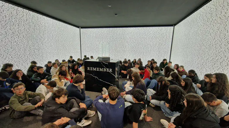 Portuguese schoolchildren in Room of Names