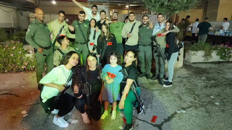 Women and children togather with the soldiers