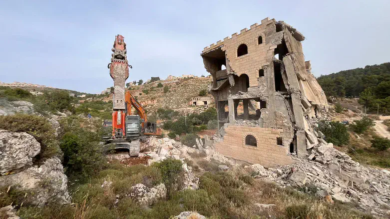 The building being demolished near Efrat
