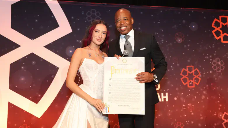 NYC Mayor Eric Adams presents Eden Golan with a proclamation declaring 'Eden Golan Day.'