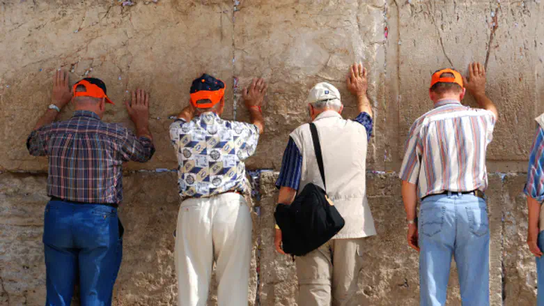 Tourists at Kotel (Western Wall) in Jerusalem