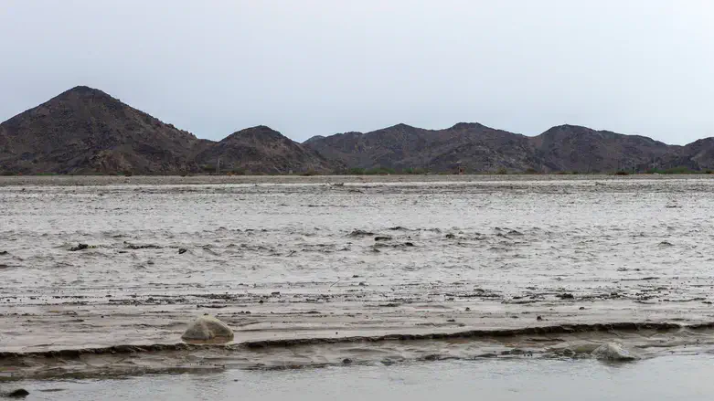 Flood water creates a channel in Port Sudan