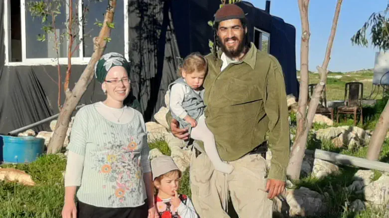 Tal (right) and his family