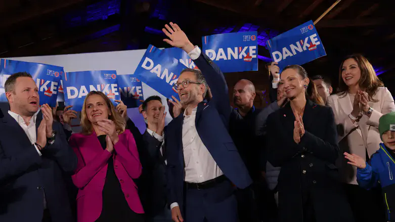 Head of the far-right Freedom Party of Austria, Herbert Kickl, celebrates with supporters