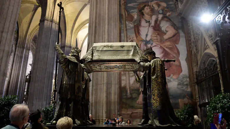 People visit the tomb of Christopher Columbus at the Cathedral of Seville, Oct. 11, 2024