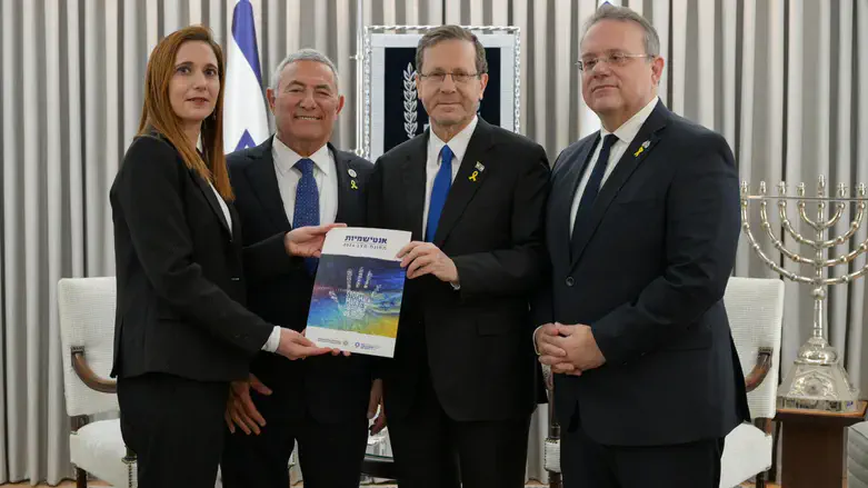 The team presenting their report on antisemitism to Pres. Isaac Herzog
